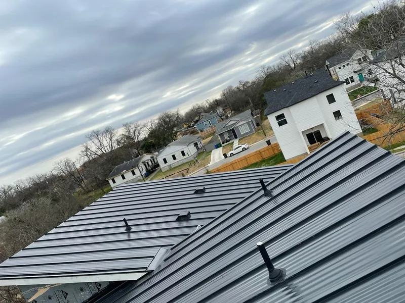 Standing seam metal roof panels with vents for Skylight Repair in Cabot
